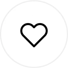 A simple black heart outline icon centered on a white circular background.