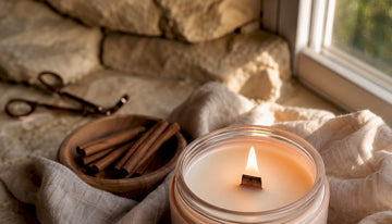 Close-up of burning wooden wick candle crackling