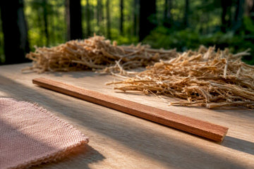 Wooden wick beside sustainably sourced timber