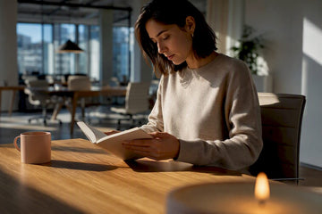 Candle warming a quiet shared office