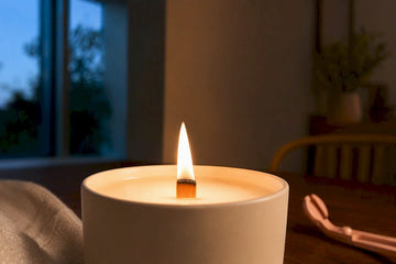 Steady flame on a wooden candle wick