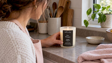Wick of Hope candle on kitchen counter