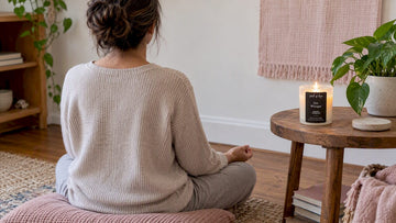 Zen Whisper candle beside a quiet meditation corner