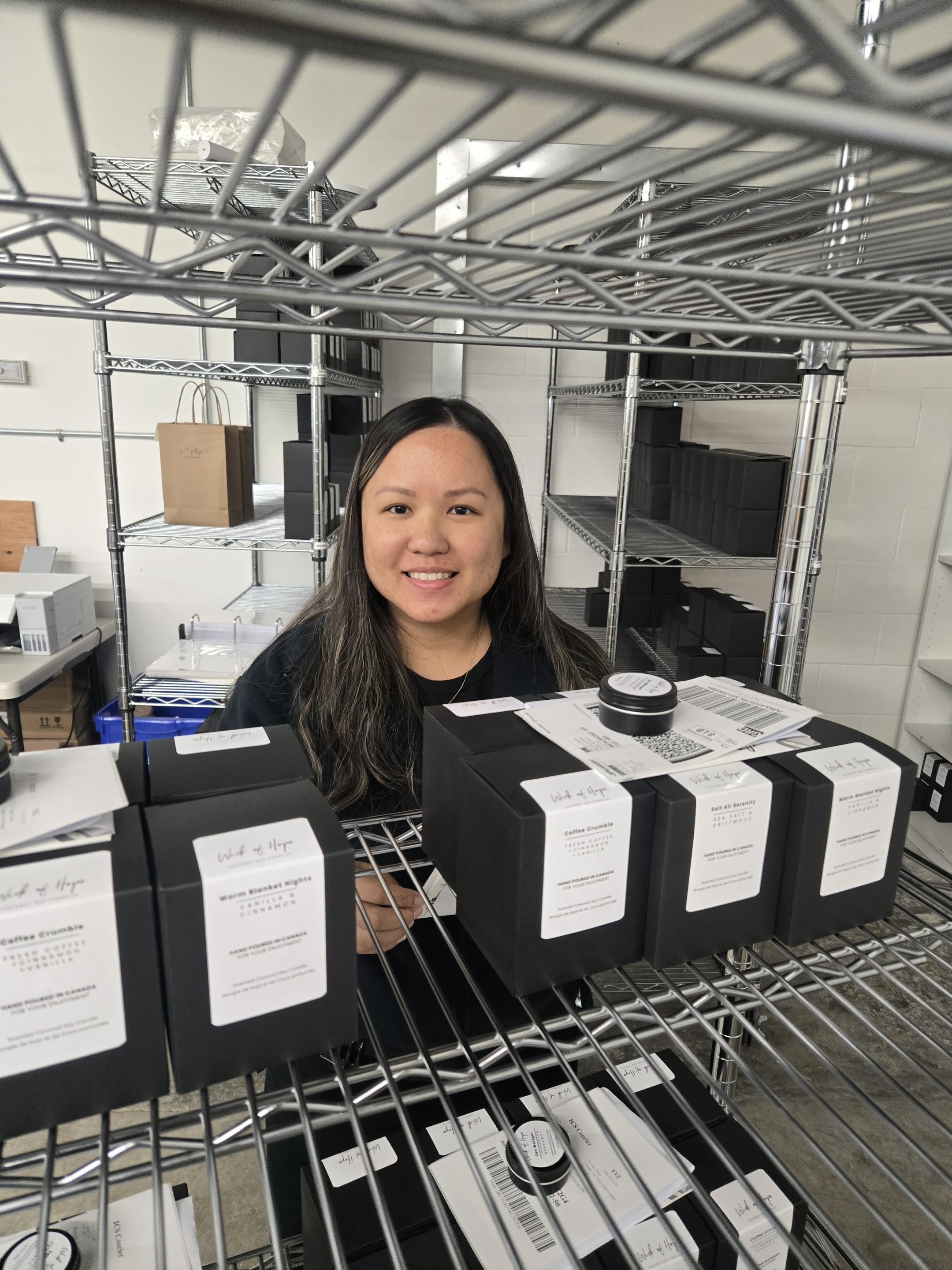 Selvia at the Wick of Hope studio packing orders