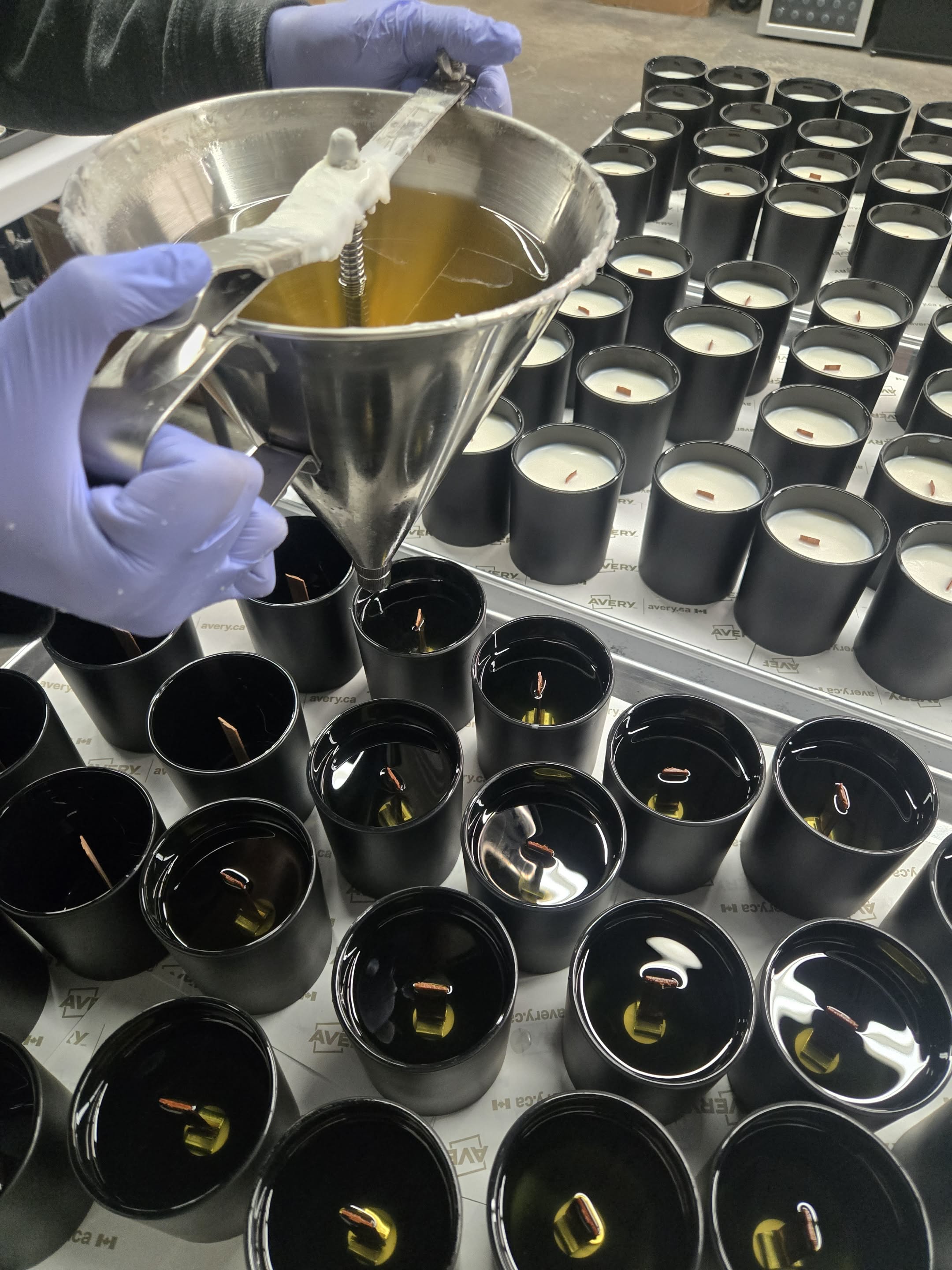 Wax being poured by hand at the Wick of Hope studio